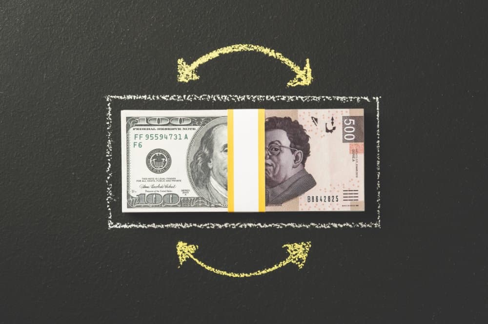 Image of money in black frame with yellow arrow highlighting financial asset.